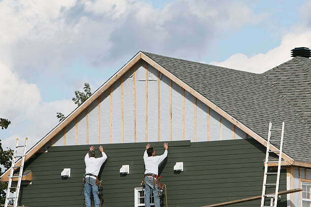 Professional Siding Replacement technician working in Burgess, VA